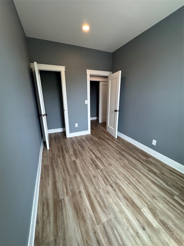 1140 Sutter Ave, Brooklyn, NY 11208 - unfurnished bedroom with wood finished floors and recessed lighting