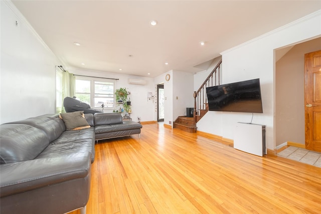 67-15 214th St, Bayside, NY 11364 - living area with an AC wall unit, stairs, light wood-style flooring, recessed lighting, and crown molding