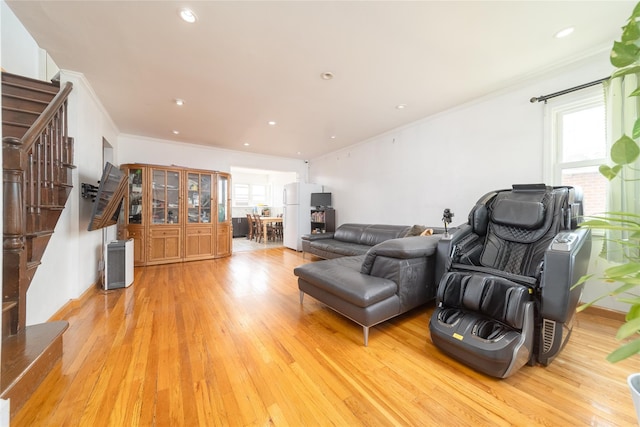 67-15 214th St, Bayside, NY 11364 - living area featuring light wood-style flooring, ornamental molding, and recessed lighting