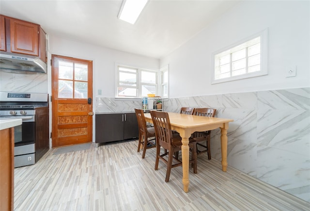 67-15 214th St, Bayside, NY 11364 - dining room with light wood-style flooring