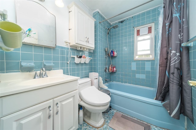 67-15 214th St, Bayside, NY 11364 - full bathroom featuring shower / bath combo, vanity, and tile walls