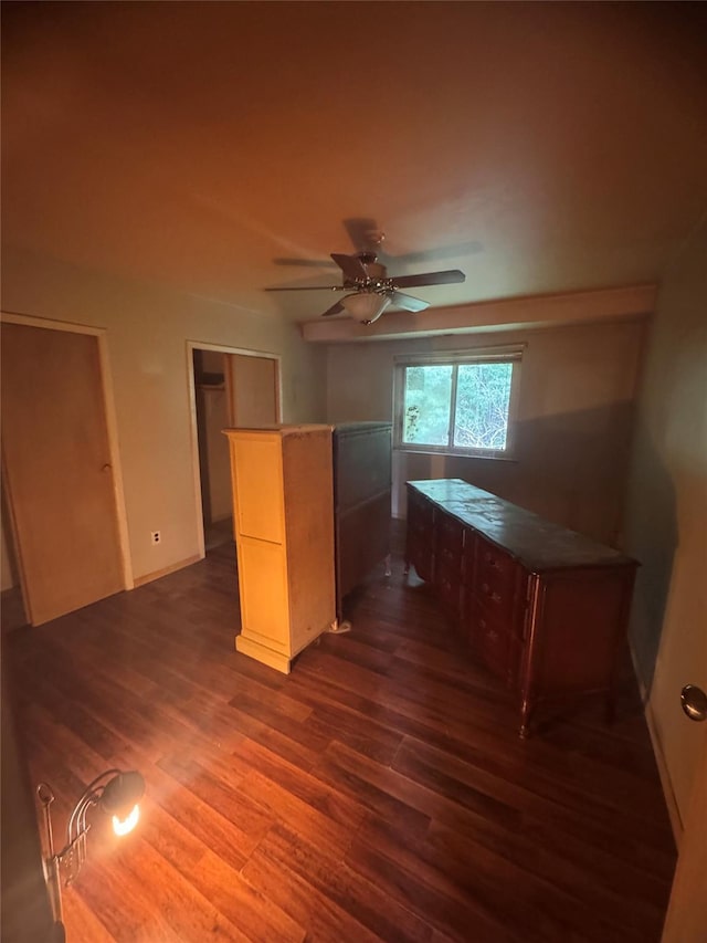 10 Palm Ct Unit 10, Selden, NY 11784 - unfurnished bedroom featuring dark wood-style floors and ceiling fan