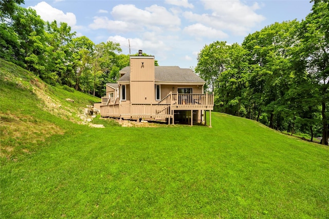 4 S Hill Rd, Tomkins Cove, NY 10986 - back of property featuring a wooden deck, a lawn, a chimney, and roof with shingles