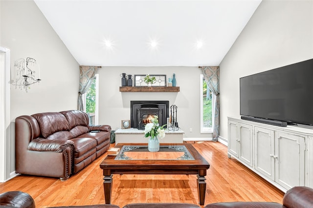 4 S Hill Rd, Tomkins Cove, NY 10986 - living area with lofted ceiling, light wood finished floors, a lit fireplace, and recessed lighting