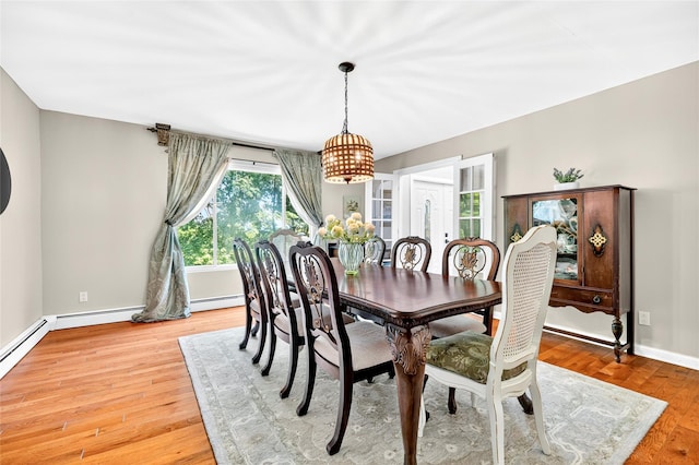 4 S Hill Rd, Tomkins Cove, NY 10986 - dining area with light wood-type flooring and a chandelier