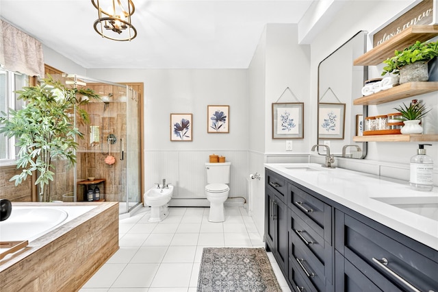 4 S Hill Rd, Tomkins Cove, NY 10986 - bathroom featuring a baseboard radiator, a shower stall, a bath, a bidet, and a wainscoted wall