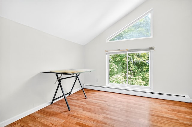 4 S Hill Rd, Tomkins Cove, NY 10986 - empty room with a baseboard heating unit, wood finished floors, healthy amount of natural light, and high vaulted ceiling