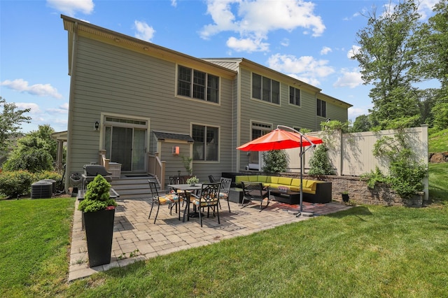 8 Langeloth Dr, Cortlandt Manor, NY 10567 - rear view of property with outdoor lounge area, a yard, and a patio area