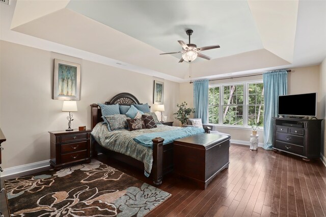 8 Langeloth Dr, Cortlandt Manor, NY 10567 - bedroom featuring a raised ceiling, dark wood-type flooring, and a ceiling fan
