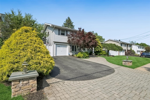 7 Nantucket Ln, Deer Park, NY 11729 - view of front of home with driveway, a garage, and a front yard