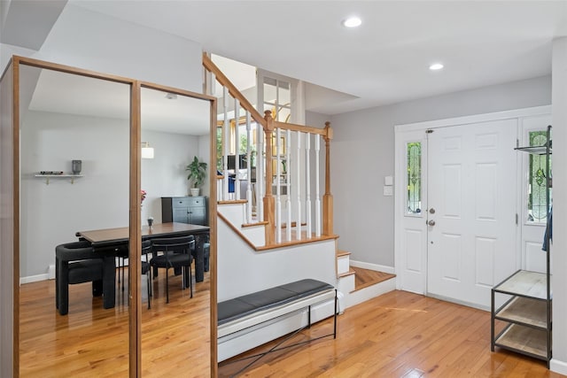 7 Nantucket Ln, Deer Park, NY 11729 - entryway with a baseboard radiator, light wood-style floors, stairway, and recessed lighting