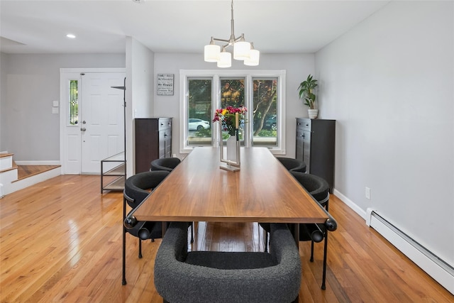 7 Nantucket Ln, Deer Park, NY 11729 - dining area with a baseboard heating unit, a chandelier, light wood-style floors, healthy amount of natural light, and recessed lighting