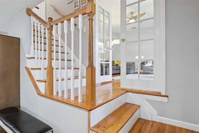 7 Nantucket Ln, Deer Park, NY 11729 - stairs featuring a ceiling fan and wood finished floors