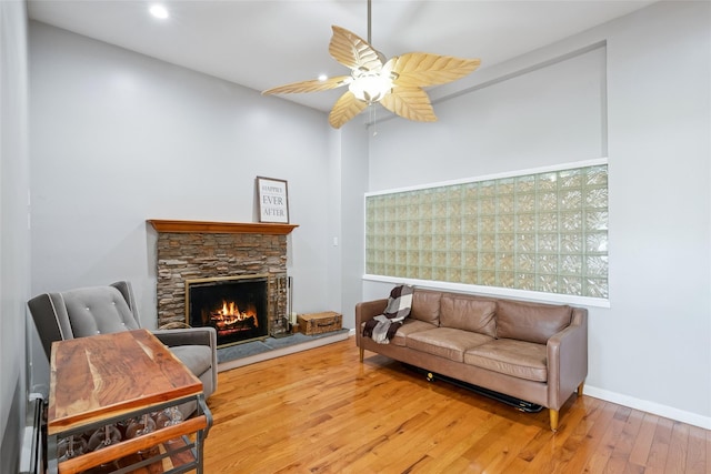 7 Nantucket Ln, Deer Park, NY 11729 - living room featuring a ceiling fan, a stone fireplace, hardwood / wood-style floors, and recessed lighting