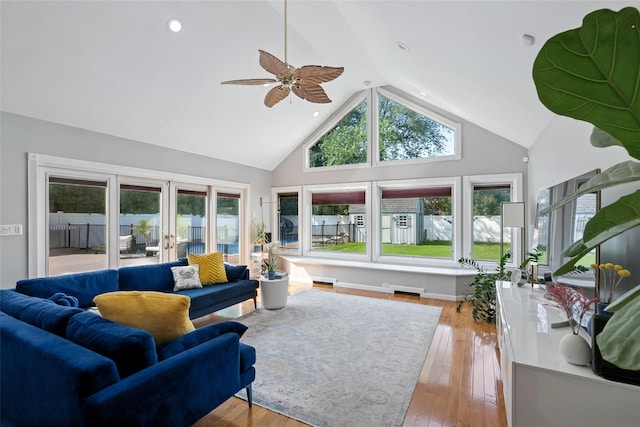 7 Nantucket Ln, Deer Park, NY 11729 - living room with a ceiling fan, high vaulted ceiling, and light wood-style floors