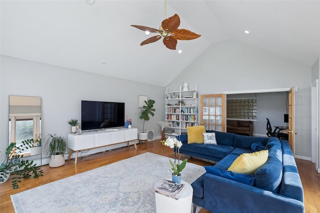 7 Nantucket Ln, Deer Park, NY 11729 - living area featuring ceiling fan, wood finished floors, and high vaulted ceiling