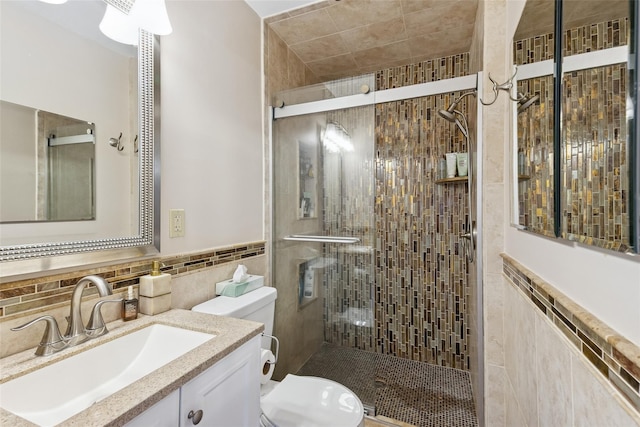 7 Nantucket Ln, Deer Park, NY 11729 - bathroom with a stall shower, vanity, and tile walls