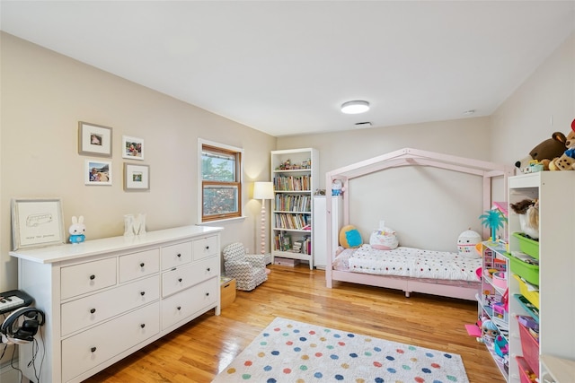 7 Nantucket Ln, Deer Park, NY 11729 - bedroom featuring light wood-style floors