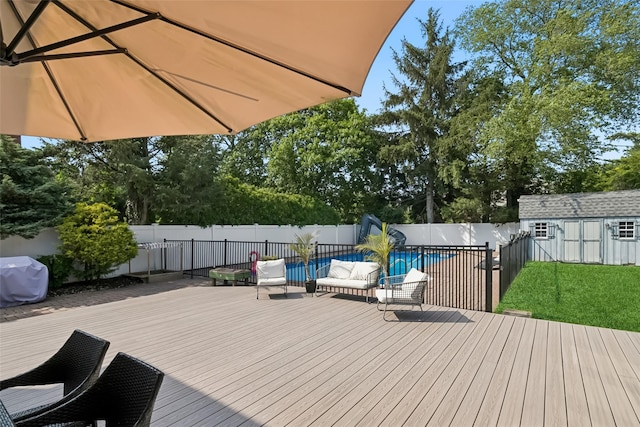 7 Nantucket Ln, Deer Park, NY 11729 - wooden terrace with a fenced backyard, an outdoor hangout area, area for grilling, and a shed