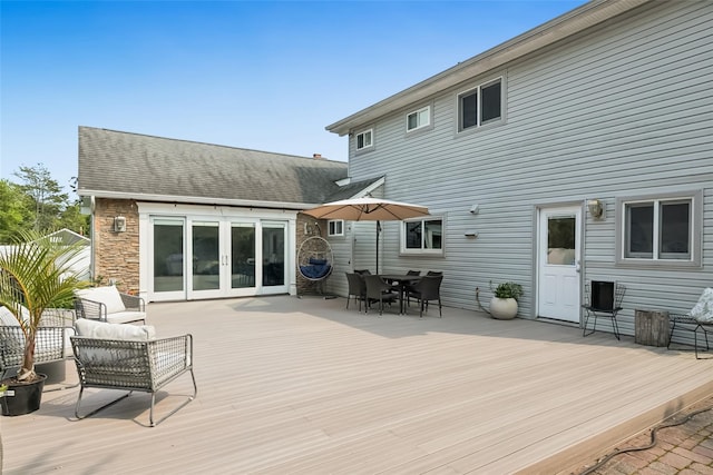 7 Nantucket Ln, Deer Park, NY 11729 - wooden deck with french doors and outdoor dining space