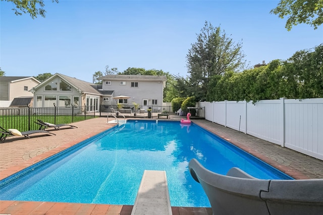 7 Nantucket Ln, Deer Park, NY 11729 - view of pool with a water slide, a patio, and a diving board