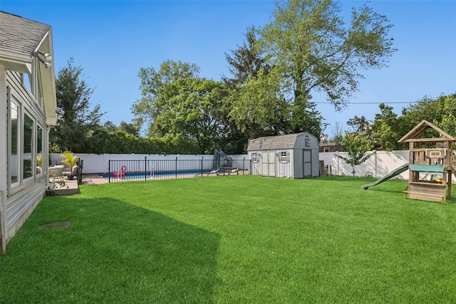 7 Nantucket Ln, Deer Park, NY 11729 - fenced backyard with a playground and a storage shed