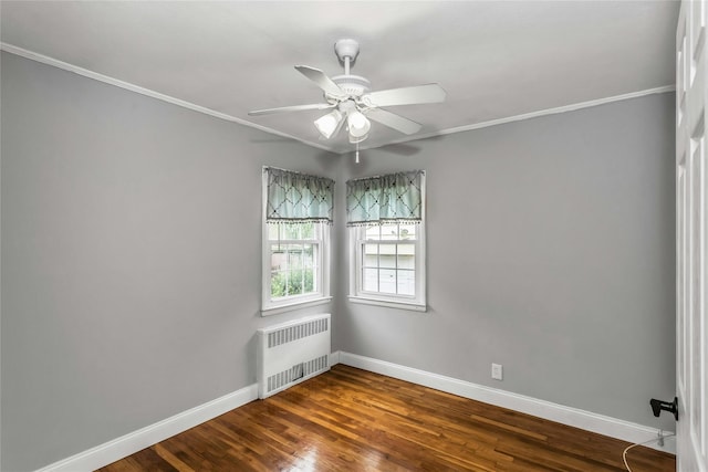20 Spring Garden St, Valley Stream, NY 11580 - spare room featuring radiator heating unit, ornamental molding, dark wood-style flooring, and ceiling fan