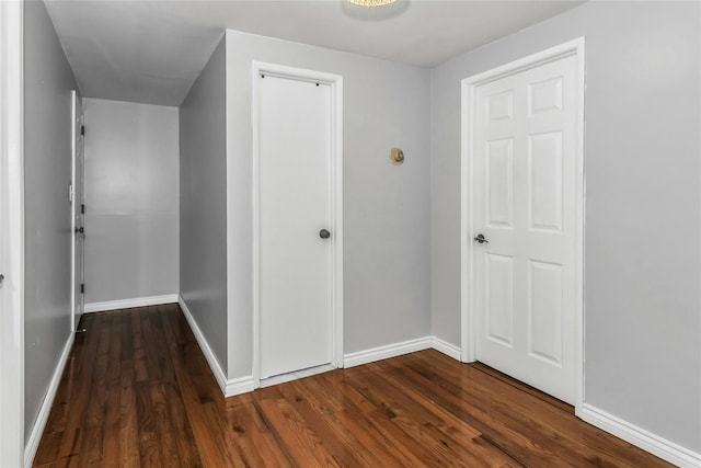 20 Spring Garden St, Valley Stream, NY 11580 - hallway featuring dark wood-type flooring and baseboards