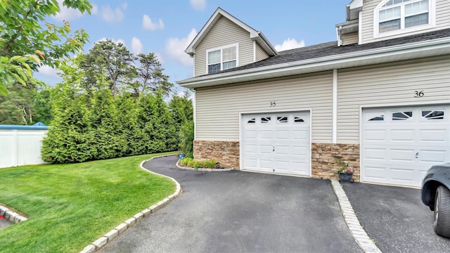 35 Terrace Ln Unit 35, Patchogue, NY 11772 - garage with asphalt driveway