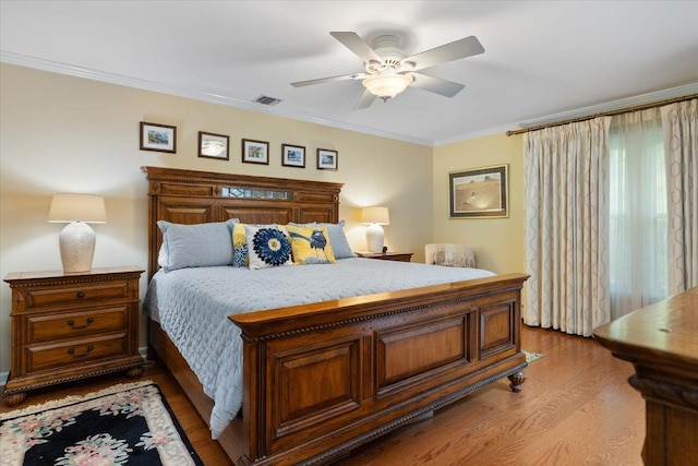 1 Ledgewood Cir E, Setauket, NY 11733 - bedroom featuring crown molding, wood finished floors, and a ceiling fan