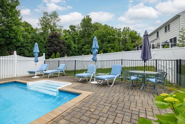1 Ledgewood Cir E, Setauket, NY 11733 - view of pool with a patio, a fenced backyard, and outdoor dining space