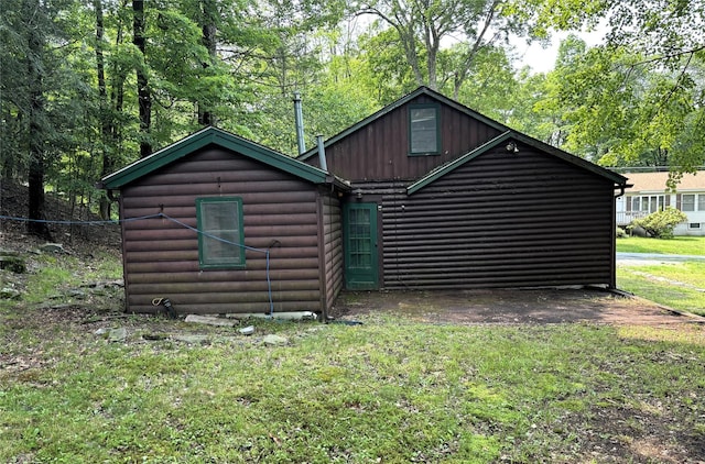 26 E Tusten, Smallwood, NY 12778 - back of house with a yard, log veneer siding, and board and batten siding