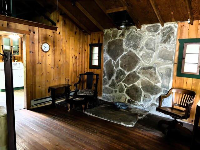 26 E Tusten, Smallwood, NY 12778 - living area with washer / dryer, wood walls, hardwood / wood-style floors, wood ceiling, and healthy amount of natural light