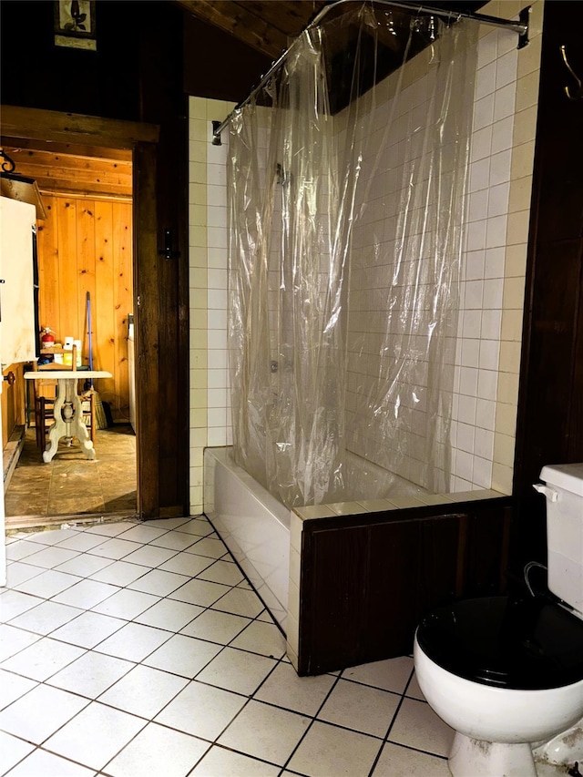 26 E Tusten, Smallwood, NY 12778 - bathroom featuring shower / tub combo, tile patterned flooring, and wooden walls