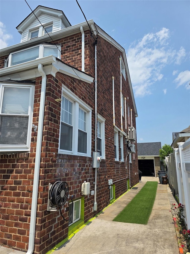 244-59 89th Ave, Bellerose, NY 11426 - view of home's exterior featuring brick siding