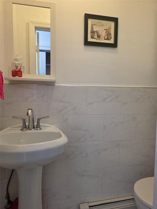 244-59 89th Ave, Bellerose, NY 11426 - bathroom featuring tile walls and a baseboard radiator