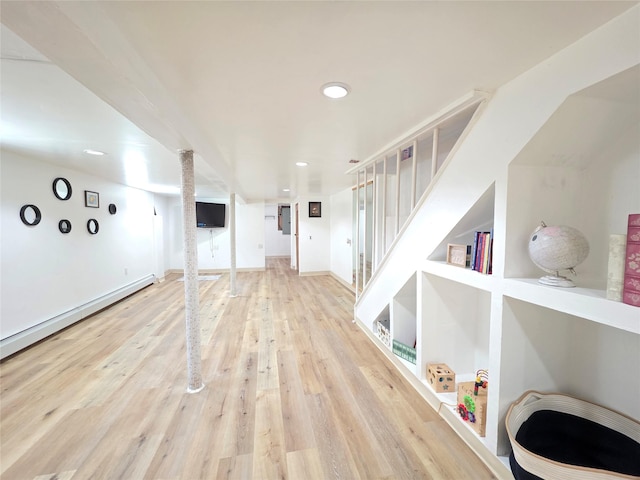 244-59 89th Ave, Bellerose, NY 11426 - finished below grade area with light wood-style flooring, stairway, and recessed lighting