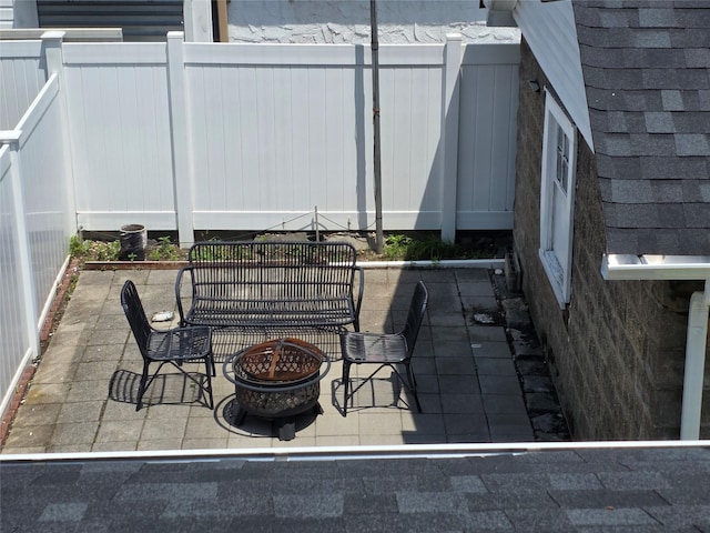 244-59 89th Ave, Bellerose, NY 11426 - view of patio / terrace featuring an outdoor fire pit