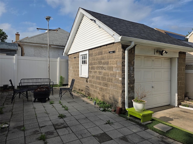 244-59 89th Ave, Bellerose, NY 11426 - view of patio with a fire pit and an outbuilding