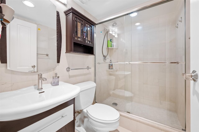 41 Wellington Ct Unit 1L, Staten Island, NY 10314 - bathroom featuring vanity, toilet, and a shower stall