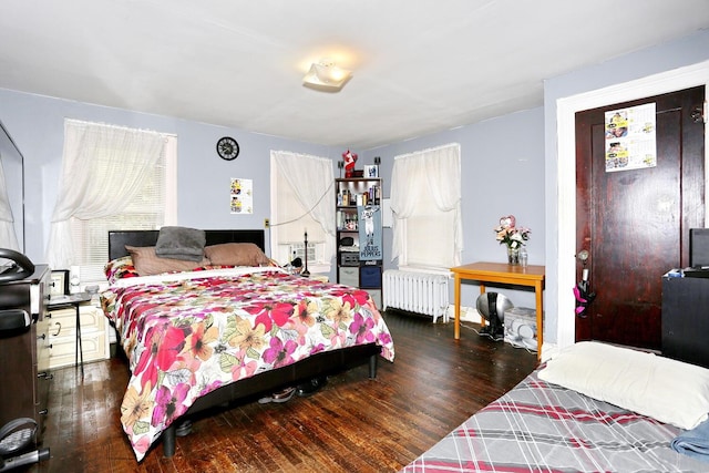23 N Midland Ave, Nyack, NY 10960 - bedroom featuring radiator heating unit and wood finished floors