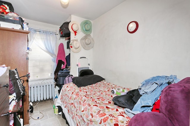 23 N Midland Ave, Nyack, NY 10960 - tiled bedroom featuring radiator heating unit