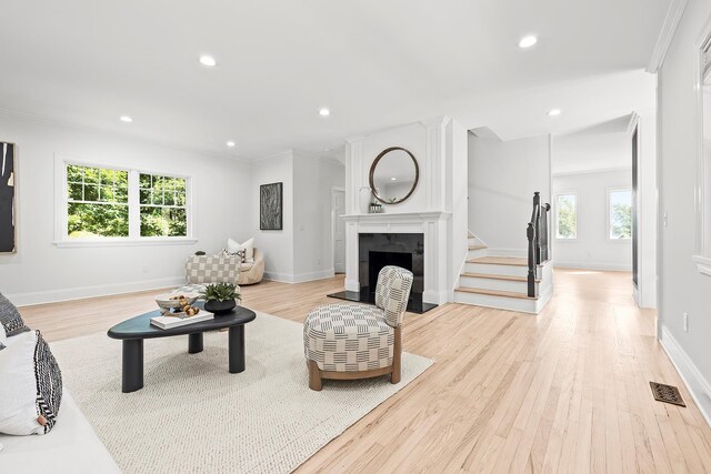 2022 Van Cortlandt Cir, Yorktown Heights, NY 10598 - living room featuring plenty of natural light, wood finished floors, stairs, recessed lighting, and ornamental molding