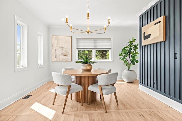 2022 Van Cortlandt Cir, Yorktown Heights, NY 10598 - dining room featuring a chandelier, ornamental molding, and wood finished floors