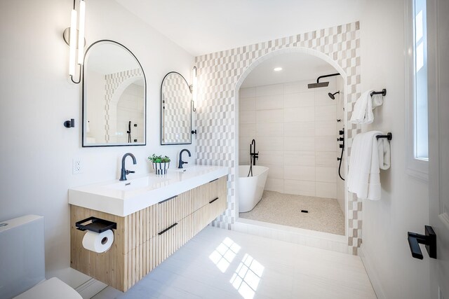 2022 Van Cortlandt Cir, Yorktown Heights, NY 10598 - full bath with a tile shower, double vanity, and a soaking tub