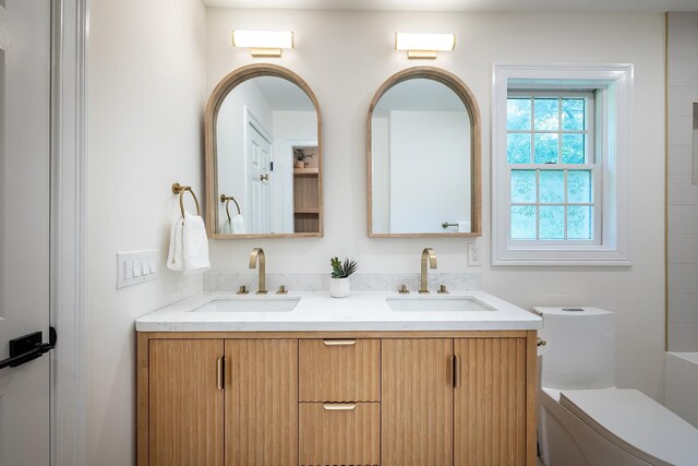 2022 Van Cortlandt Cir, Yorktown Heights, NY 10598 - bathroom featuring double vanity and toilet