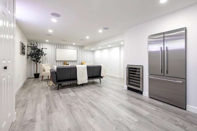 2022 Van Cortlandt Cir, Yorktown Heights, NY 10598 - living room featuring beverage cooler, light wood finished floors, and recessed lighting