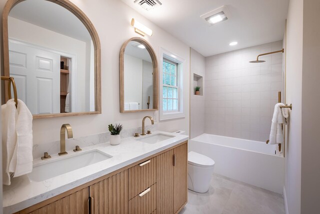 2022 Van Cortlandt Cir, Yorktown Heights, NY 10598 - bathroom featuring double vanity and washtub / shower combination