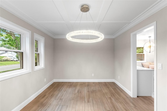 105 Julbet Dr, Sayville, NY 11782 - unfurnished room with healthy amount of natural light, light wood finished floors, a chandelier, and ornamental molding