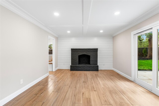 105 Julbet Dr, Sayville, NY 11782 - unfurnished living room with light wood-type flooring, recessed lighting, a fireplace, ornamental molding, and beam ceiling